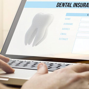 dental insurance form on laptop