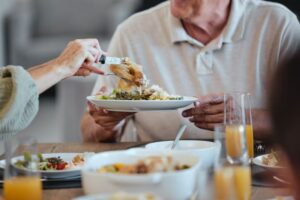 Older couple sharing a tasty meal